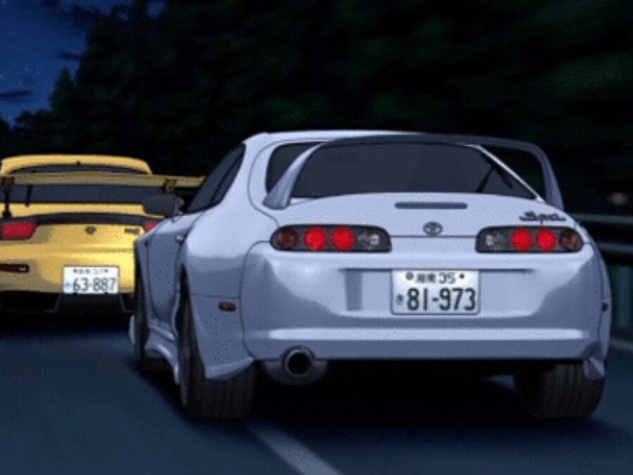 Toyota Supra Chasing a Mazda RX-7